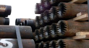 Toothed casing components stacked for delivery